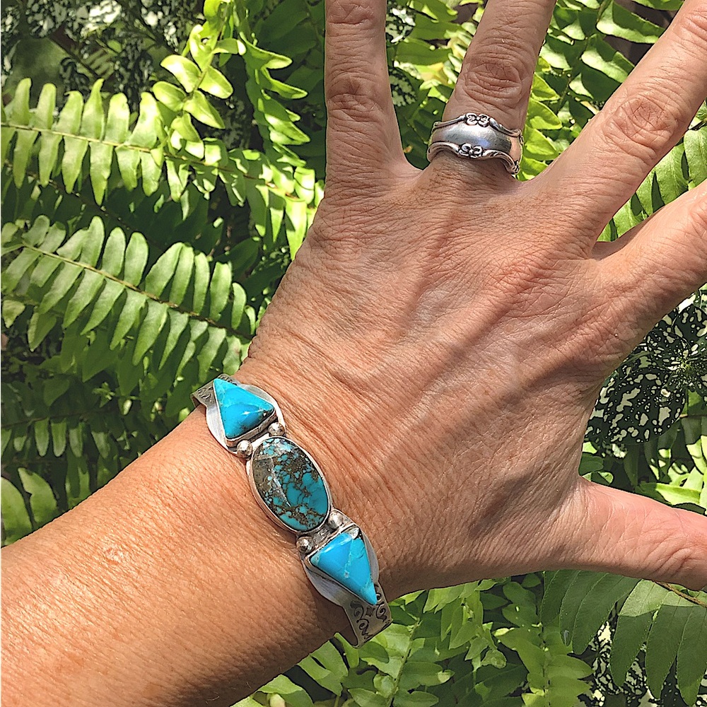Turquoise/sterling cuff, adjusts:6 1/2-7 1/4” wrist